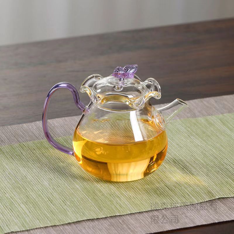 Nueva tetera con forma de flor de mariposa de vidrio de borosilicato